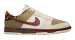 Beige and white sneaker with red accents on a white background - Image 1
