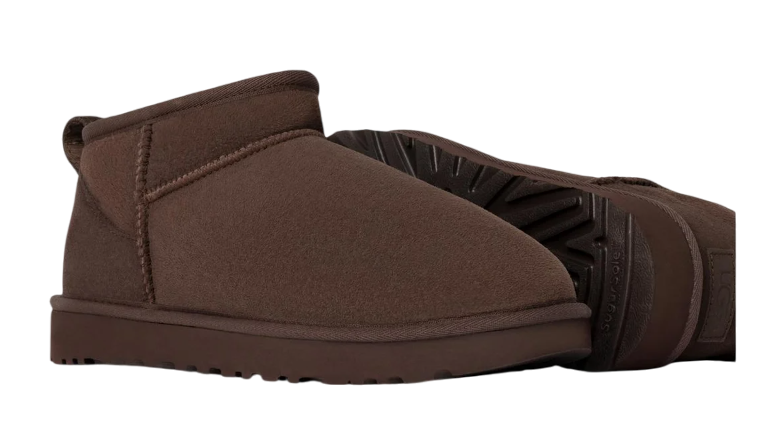 Brown slip-on shoe on a white background