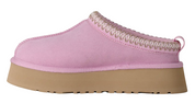 Pink slip-on shoe with a beige sole on a white background