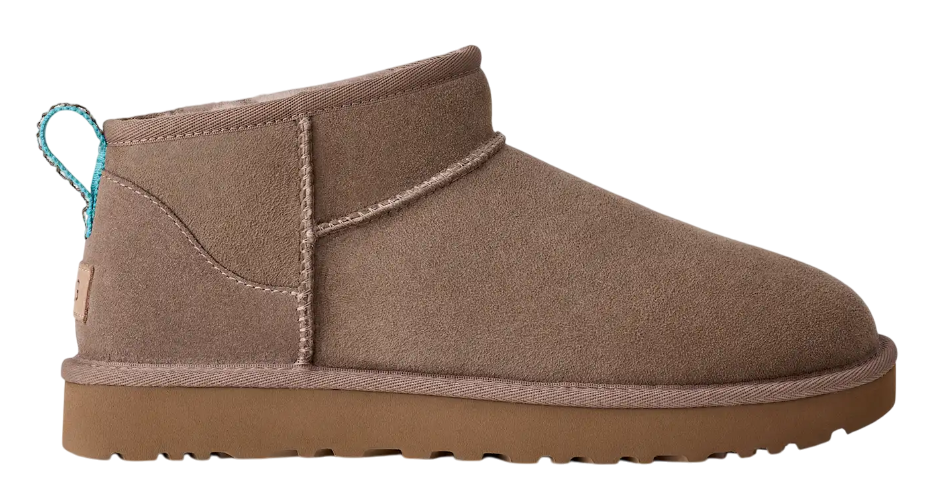 Brown suede ankle boot with a white background