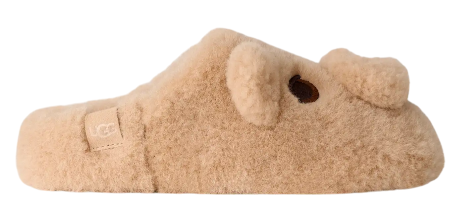Beige slipper with a fluffy texture on a white background