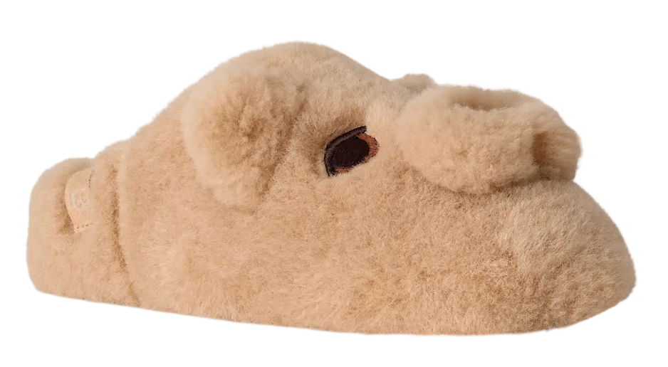 Beige slipper with bear design on a white background