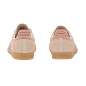 Pair of pink sneakers with brown soles on a white background