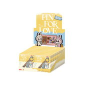 Display box of 'Pin for Love' with cartoon characters on a white background