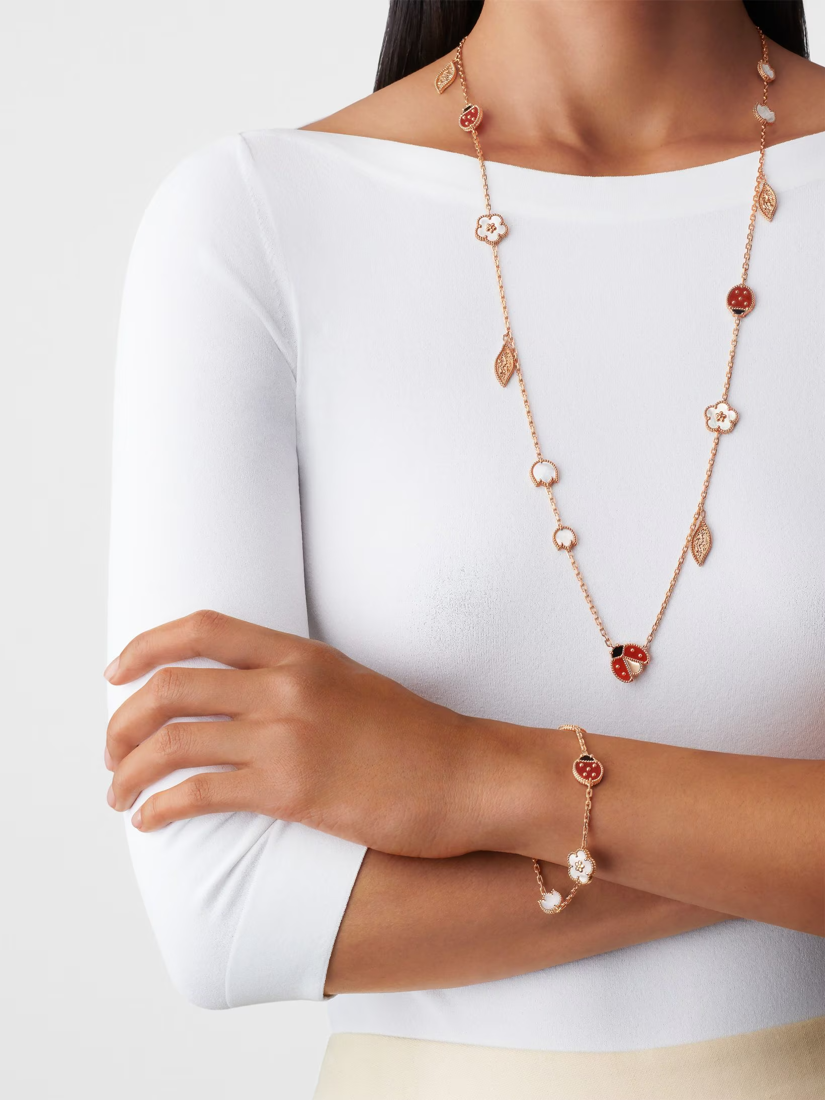 Van Cleef & Arpels Lucky Spring bracelet, 5 motifs 18K rose gold, Carnelian, Mother-of-pearl, Onyx