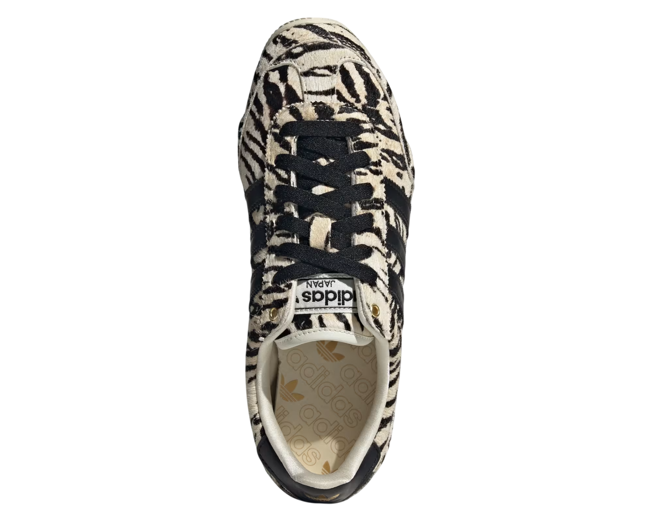 Sneaker with zebra pattern on a white background