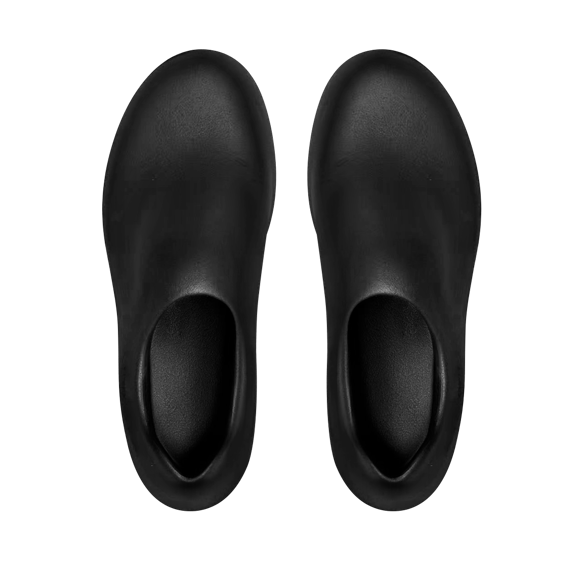 Pair of black slippers on a white background