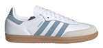 White Adidas sneaker with blue stripes on a white background - Image 1
