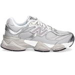 White sneakers with brand logo on a white background - Image 1