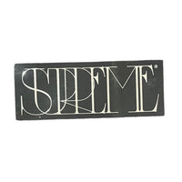 Supreme adesivo in stile vecchio con scrittura corsiva